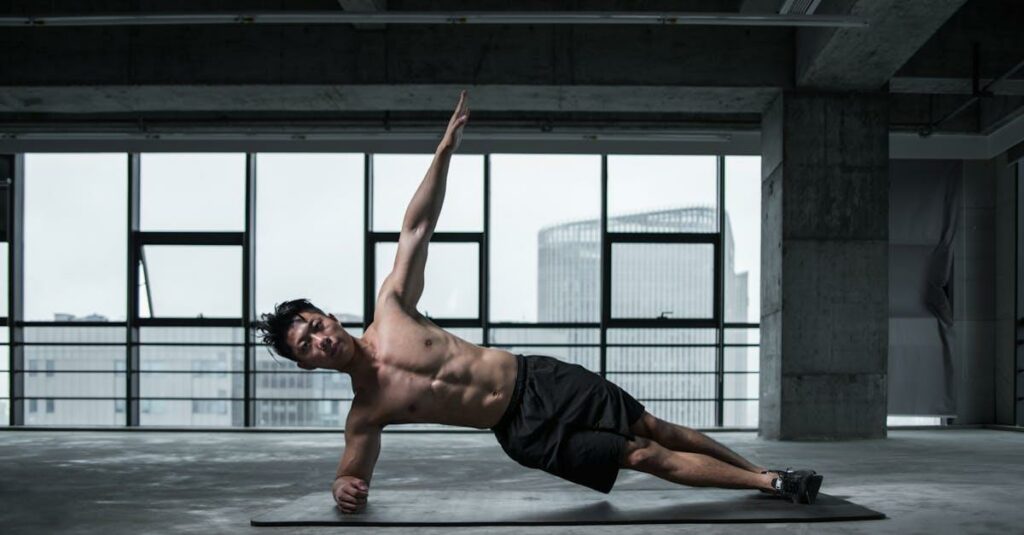 Fit man doing a side plank in an urban indoor gym, showcasing core strength and balance.